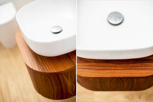 wooden detail of the renovated bathroom 