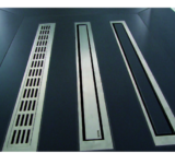 Shower with gutter – solution for continuous floors in bathroom desig