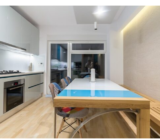 Modern furnishings with color accents, in a villa in Bucharest